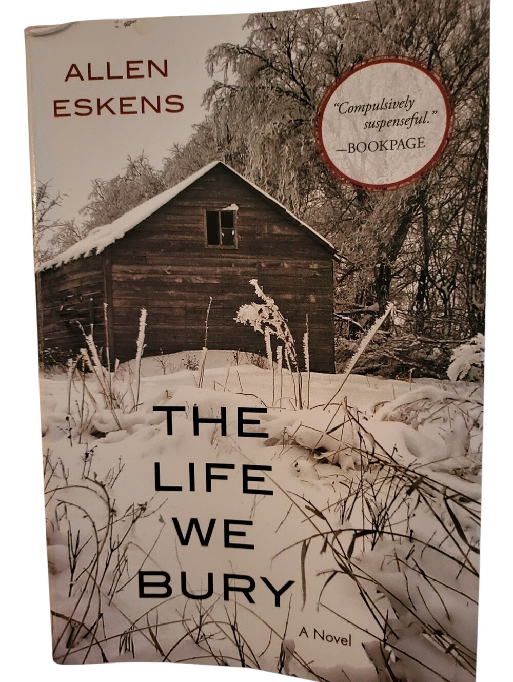 The Life We Bury by Allen Eskens - Paperback Book, White & Brown Cover